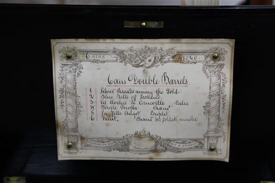 A Swiss six air Etouffoirs en Acier cylinder music box, no. H8020, with part hand-written label, in inlaid rosewood and ebonised case